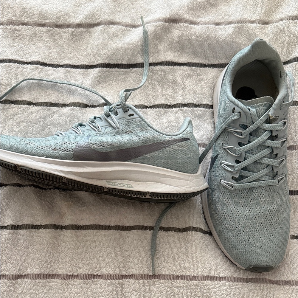 Nike Light Blue Running Sneakers with Gray Swoosh